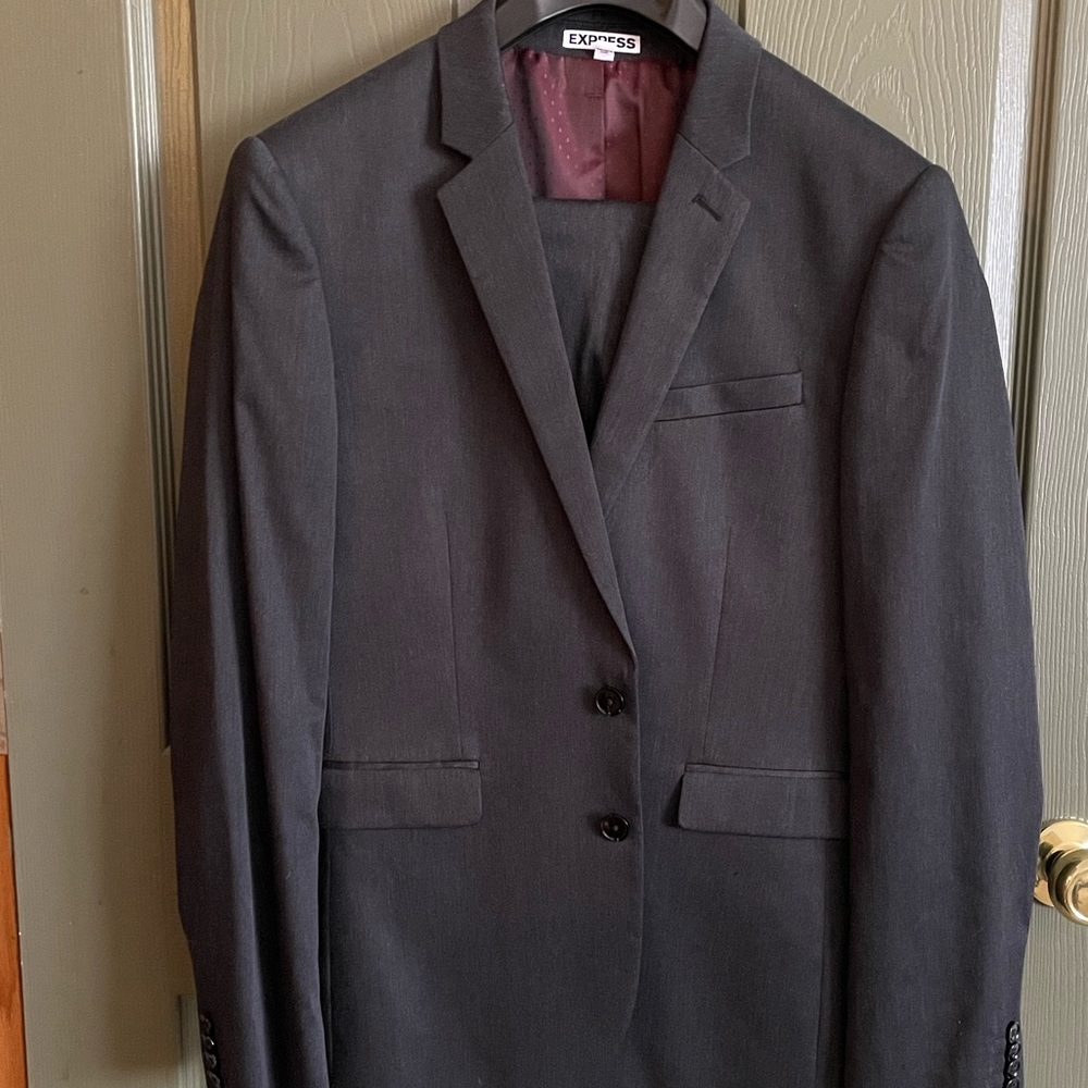 Men’s Express suit. Charcoal grey. Worn once. Excellent condition.
